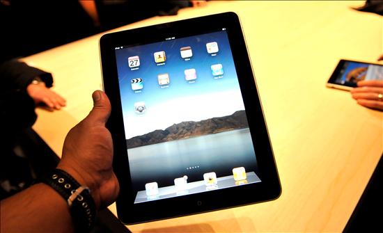 iPad Apple Mano Home Screen