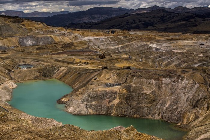 An acid water lagoon, resulting from the mining process, sits at the Yanacocha gold mine in Cajamarca, Peru, on Friday, Oct. 16, 2015. Operations at Yanacocha, South America's largest gold mine, are a joint venture between Newmont Mining Corp., Minas Buenaventura and International Finance Corp. Photographer: Dado Galdieri/Bloomberg