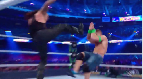 [VIDEO] Ni lo tocó: la comentada pésima simulación de John Cena ante patada del Underaker