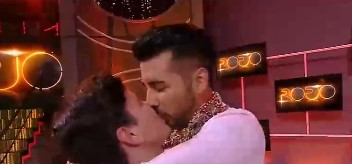Hernán Arcil se convierte en el primer ganador de Rojo y las RRSS festejan con imagen del beso con su pololo