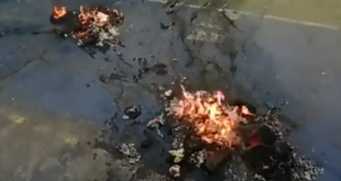 Municipio de Santiago se querella contra responsables de la quema del estandarte del Instituto Nacional