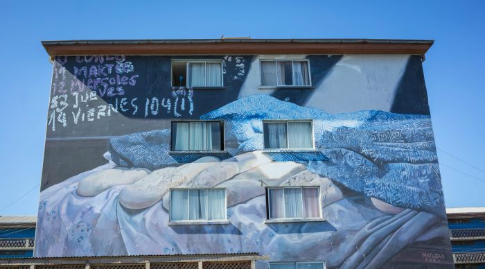 Artistas reconocidos mundialmente retratan la historia minera de Coronel en sus muros
