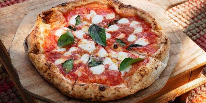 El auge de la pizza en Chile: entre sabores clásicos, hornos de leña y propuestas gourmet