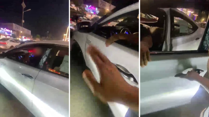 Un video publicado por Jassim muestra a una mujer gritándole a un hombre al que acusa de exhibicionismo, para luego intentar abrir la puerta de su auto.